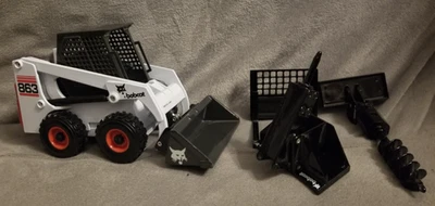 Bobcat 863 Turbo Skid-Steer Loader w/ 4 Attachments #6900569 Diecast Wan Ho 1:25 - Image 1 of 4
