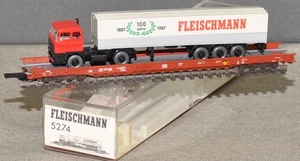 Fleischmann 5274 Niederflurwagen 8-achsig mit LKW Fleischmann fabrikneu OVP a H0 - Picture 1 of 1
