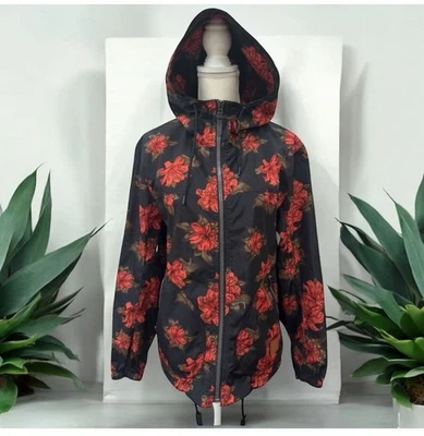 Chaqueta con capucha cortavientos floral COACH talla pequeña Foto 1 de 4