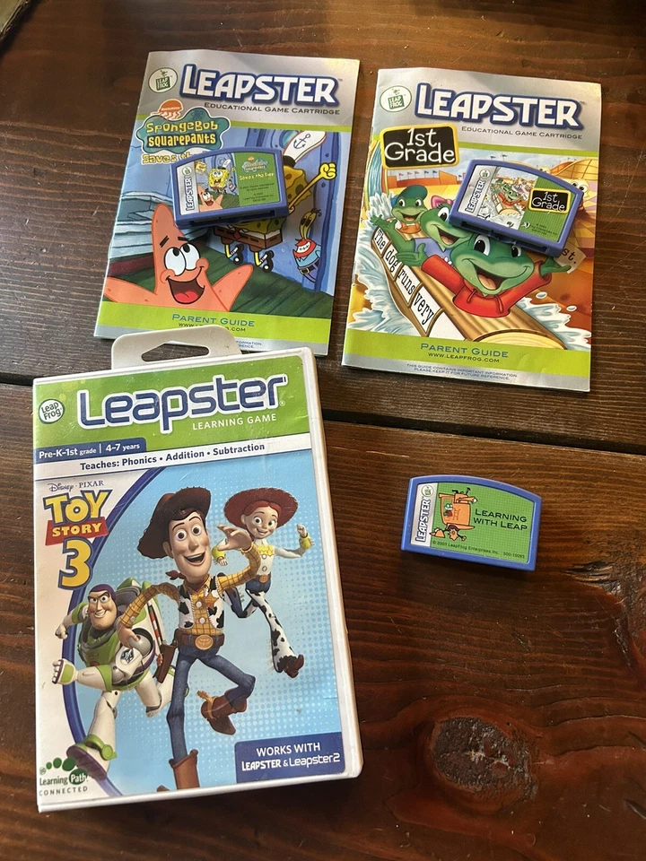 LeapFrog Leapster lot of 4 learning game lot. toy Story , Spongebob others. - Image 1 of 1