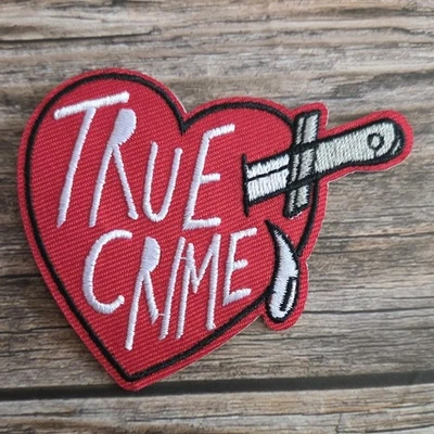 True Crime Dagger In Heart Murder Mystery Betrayal Goth Iron On Patch - Image 1 of 2