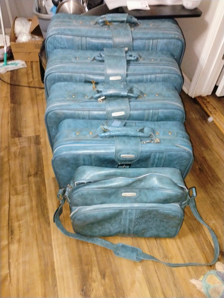 World Traveler Faux Leather Luggage Set of 5 Blue Nesting Suitcases Vacation - Image 1 of 2