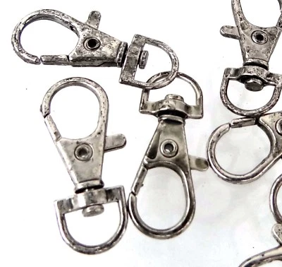 8 broches giratorios de langosta de peltre plateado antiguos de 35 mm para llaveros, correas  Foto 1 de 4