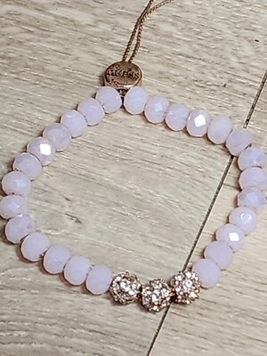 Brazalete brazalete GUESS Jeans pedrería logotipo tono oro rosa dijes  Foto 1 de 4