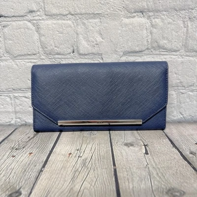 Cartera Tumi Continental Foto 1 de 4