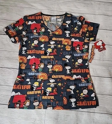 NWT Peanuts Snoopy Thanksgiving Tooniforms Short Sleeve V-Neck Scrub Top - Image 1 of 4