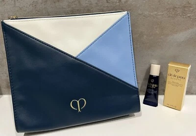 Bolso de Belleza Cle De Peau en Azul y Blanco y Cierre de Cremallera y Emulsión Fortificante 5ML Foto 1 de 3