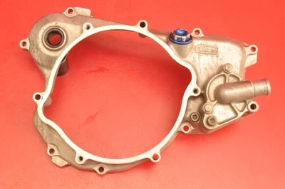 Suzuki RM125 RM 125 2005 01-07 lado derecho interior embrague cesta cubierta bomba de agua Foto 1 de 4