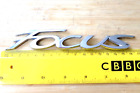 Focus Chrome Script Car Badge 16.5Cm. F1eb-R42528-Aa For Ford. Dated 2/14