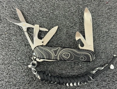 Navaja suiza Victorinox Super Tinker 91 mm con escalas topográficas de titanio personalizadas Ti Foto 1 de 4