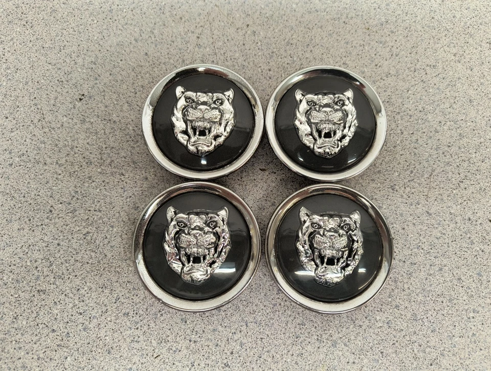 TAPA CENTRAL DE RUEDA GRIS BORDE CROMADO JAGUAR XJ6 XJS XJ8 XK8 OEM Foto 1 de 4