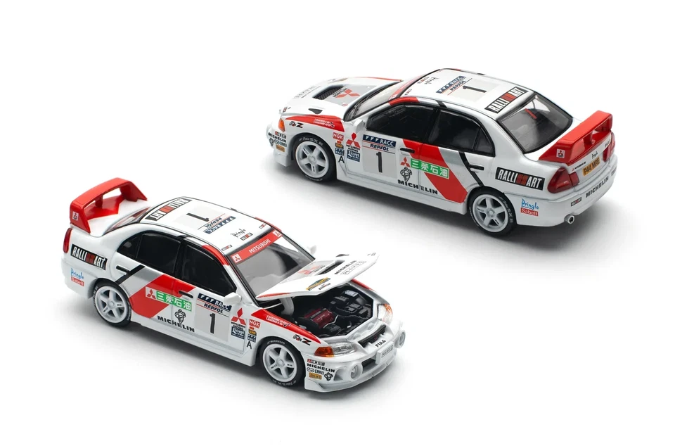 1/64 MITSUBISHI LANCER EVO IV #1 WINNER RALLY DE CATALUNYA 1997 POP RACE - Immagine 1 di 1