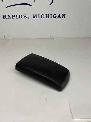 Chevrolet Impala 2010 consola central reposabrazos/tapa; ébano; 15779837 Foto 1 de 3