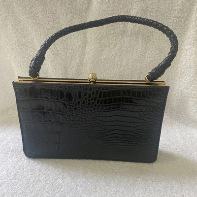 Bolso de mano Isaac Mizrahi negro animal imitación cuero asa superior usado en excelente estado 30 Foto 1 de 4