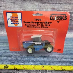 Vintage 1994 Scale models 1/64 scale Ford 946 4wd die-cast tractor blue/white - Picture 1 of 7