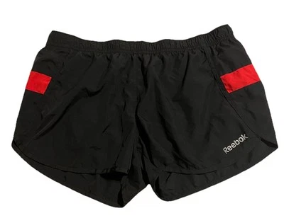 Pantalones cortos de running para mujer Reebok Play Dry forrados en negro y rojo talla mediana Foto 1 de 4