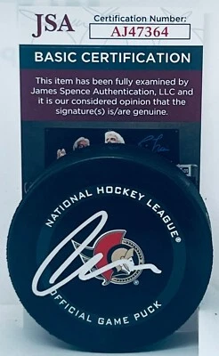 Thomas Chabot signed Ottawa Senators Official Game Puck autographed JSA - Image 1 of 2
