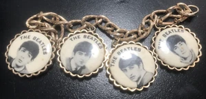 THE BEATLES - VINTAGE CHARM BRACELET - BY NEMS ENT - GOLD COLORED - 1964 - Picture 1 of 7