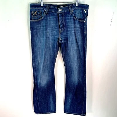 Pantalones de mezclilla rectos azules con botones lavados oscuros frente plano mezcla para hombre talla 32 Foto 1 de 4