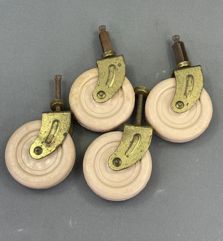 4 vintage plastic furniture casters - 1.5” pin & 2.75" diameter beige  wheels Cover