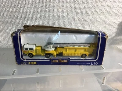 Camion dei pompieri lungo Tomica L10-1-2 scala americana giallo made in Japan - Immagine 1 di 4