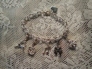 Bettelarmband von P&G (Procter&Gamble)mit 5 Charms - Bild 1 von 2