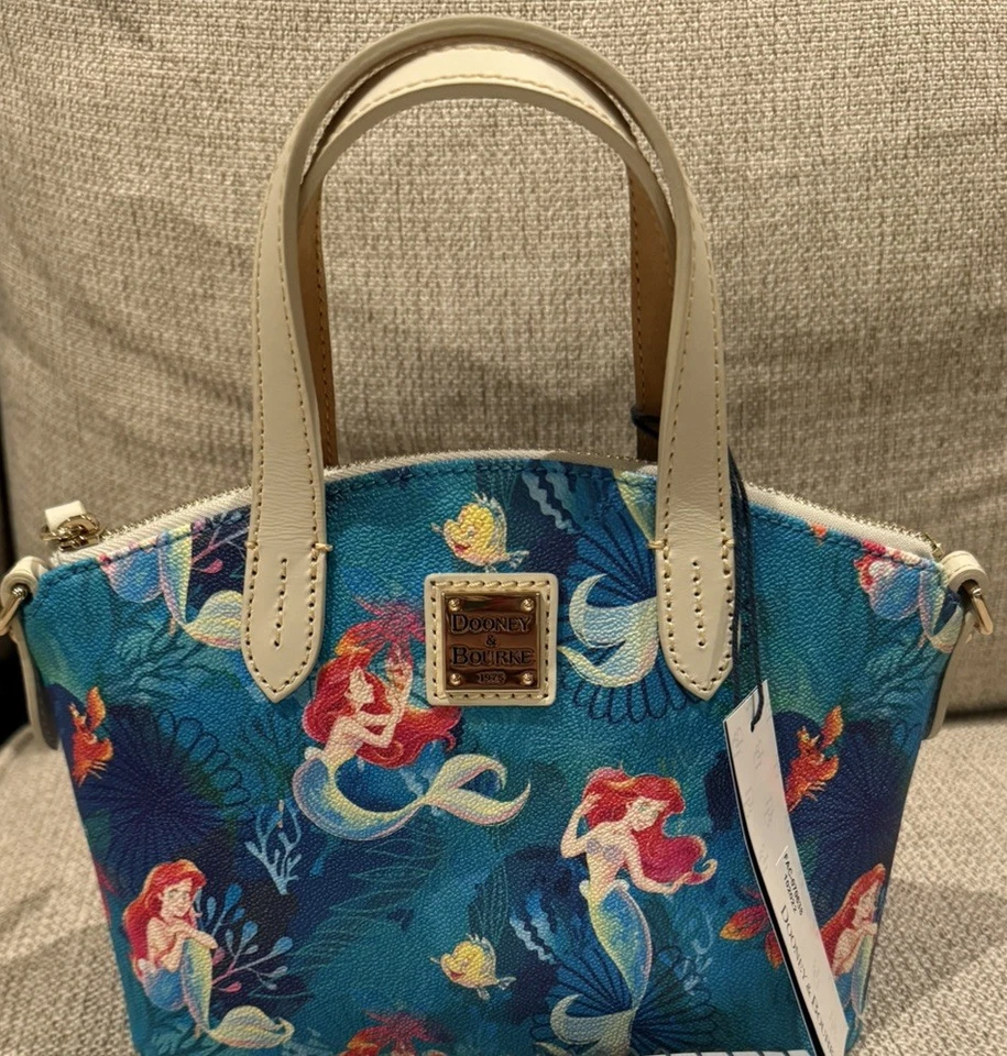 Bandolera Dooney & Bourke Disney La Sirenita Foto 1 de 3