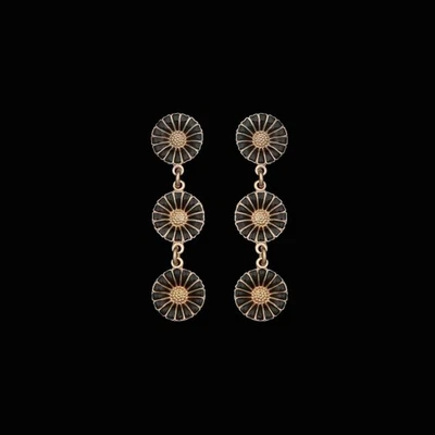 Georg Jensen. Brincos triplos DAISY de prata esterlina dourada com esmalte preto. - Imagem 1 de 4