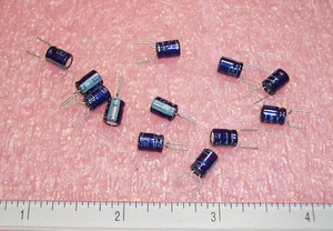 QTY (100) 47uf 16V 85' 5x7mm MINIATURE RADIAL ELECTROLYTIC 16MS7-47M RUBYCON - Picture 1 of 5