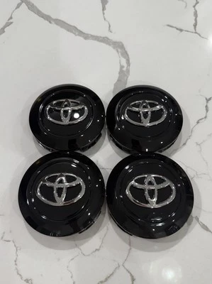 Toyota 2016-2021 LAND CRUISER Wheel Center Cap SubAssy 4260B60370 Hub Caps Black - Image 1 of 4