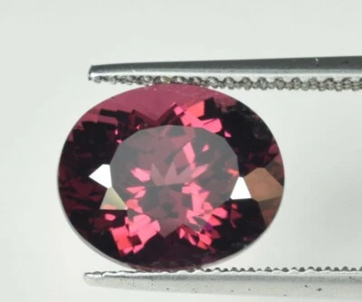 6.11 ct TOP LUSTROUS PINKISH RED NATURAL RHODOLITE GARNET OVAL  See Video - Image 1 of 3
