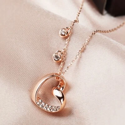 18K Rose Gold Filled Made With SWAROVSKI Crystal Lock Twisted Heart Necklace - Image 1 of 4