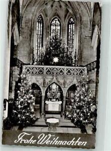 39817948 - 7400 Tuebingen Leuchtende Weihnachtsbaeume in der Stiftskirche
