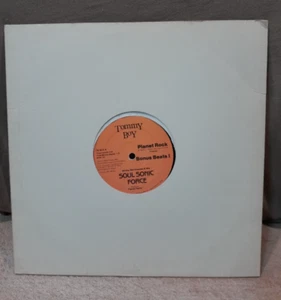 Afrika Bambaataa & the Soul Sonic Force Music by Planet Patrol, Tommy Boy TB 823 - Picture 1 of 4