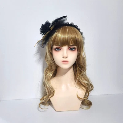 Diadema Lolita gótica hecha a mano negra y dorada Foto 1 de 4