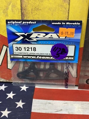 XRAY 30 1218 T2 COMPOSITE UPPER HOLDER for: FRONT BUMPER 1pc. NEW USA SHIPPED - Image 1 of 4