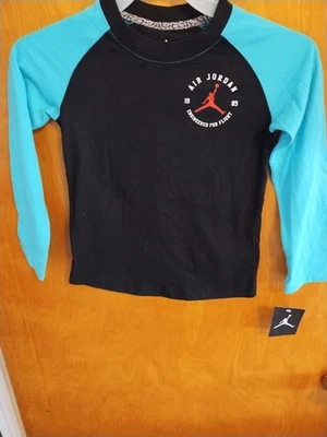 Air Jordan Kids Size 7 Long Sleeve T-shirt. Black/Green - Image 1 of 4