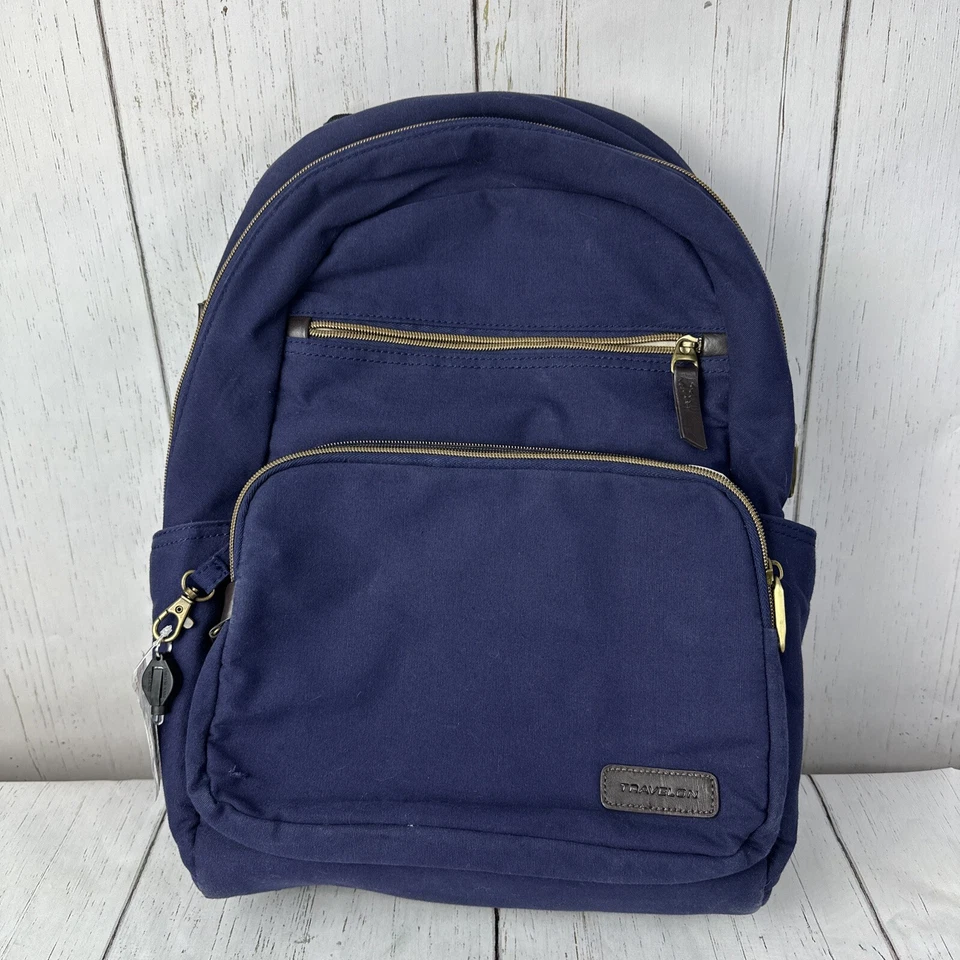 Mochila delgada Travelon antirrobo Courier - Lona azul marino - Cremalleras de bloqueo Foto 1 de 4