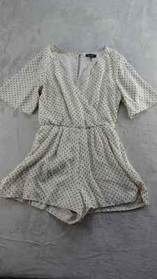 Mameluco a lunares TRIXXI para mujer manga corta mediana cuello en V beige negro Foto 1 de 4