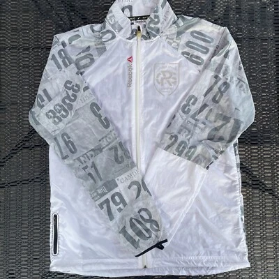 Chaqueta cortavientos retro mediana de colección Reebok City Run Series London para mujer Foto 1 de 4