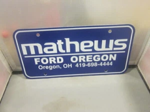 MATHEWS FORD OREGON, OH Dealer  Plate Frame Insert Plastic Man Cave - Picture 1 of 2