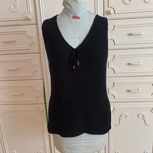 BLUSA SIN MANGAS NEGRA DE PUNTO SEDA AGOSTO CON LAZO DELANTERO TALLA. L - Imagen 1 de 12