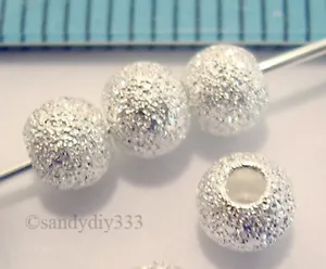 100 x STERLING SILVER STARDUST ROUND SPACER BEADS 4mm N074A - Picture 1 of 2