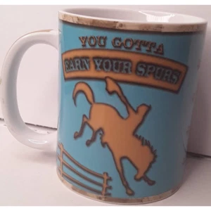 "You Gotta Earn Your Spurs" Coffee Mug 2013 Cape Shore - Picture 1 of 7