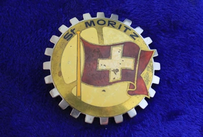 Insignia de rejilla cromada vintage St Moritz parachoques emblema Suiza Foto 1 de 4