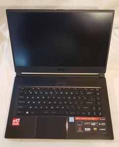 MSI GS65 Stealth Thin 8RF 15.6" Laptop (intel Core i7-8750H) - For Parts/Damaged - Picture 1 of 12