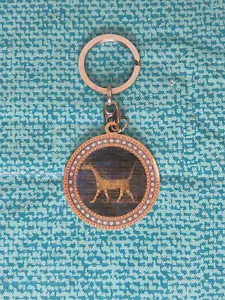 Portachiavi vintage metallo disco animale egiziano marrone tono argento anello tondo - Foto 1 di 6