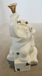 ELEFANTE DE NAVIDAD Formalidades Baum Bros Marfil con Acebo y Baya y Estatuilla Dorada - Imagen 1 de 5