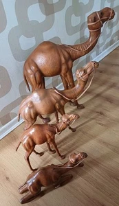 VINTAGE LEATHER CAMELS GROUP OF 4 WRAPPED TAN VARIOUS SIZES 26" 18" 12" 8" HIGH - Picture 1 of 13