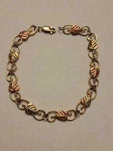 Bracciale maglia a rotolo filigrana oro giallo 10 kt con foglie oro verde e rosa 12 kt - Foto 1 di 8